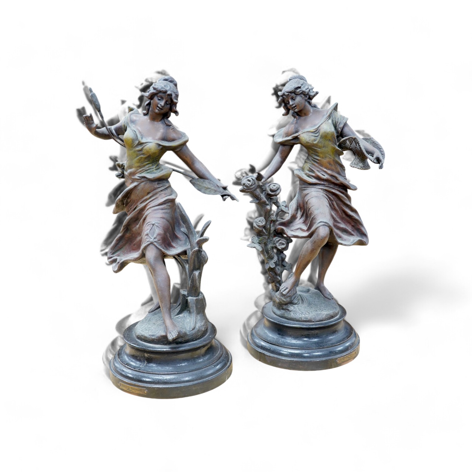 A pair of spelter figures of muses, 38cm. Condition - fair